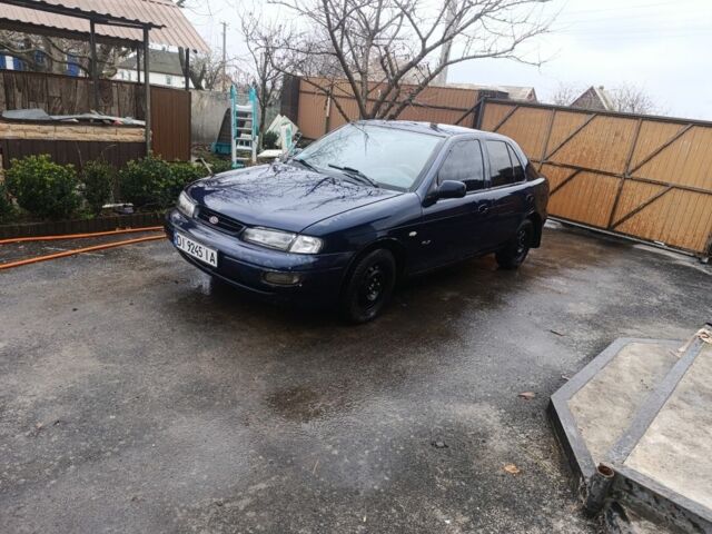 Синий Киа Сефия, объемом двигателя 1.8 л и пробегом 235 тыс. км за 1000 $, фото 1 на Automoto.ua