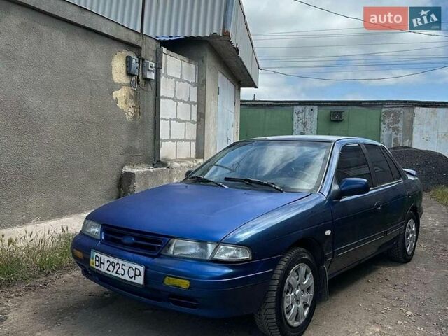 Синий Киа Сефия, объемом двигателя 1.6 л и пробегом 200 тыс. км за 750 $, фото 1 на Automoto.ua