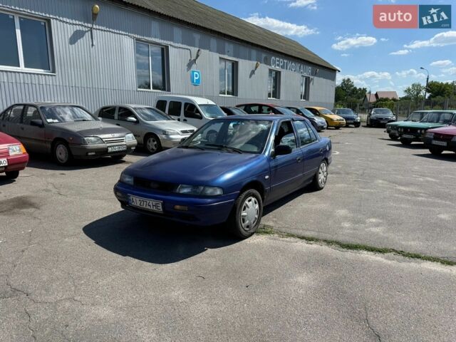 Синий Киа Сефия, объемом двигателя 1.6 л и пробегом 250 тыс. км за 950 $, фото 1 на Automoto.ua
