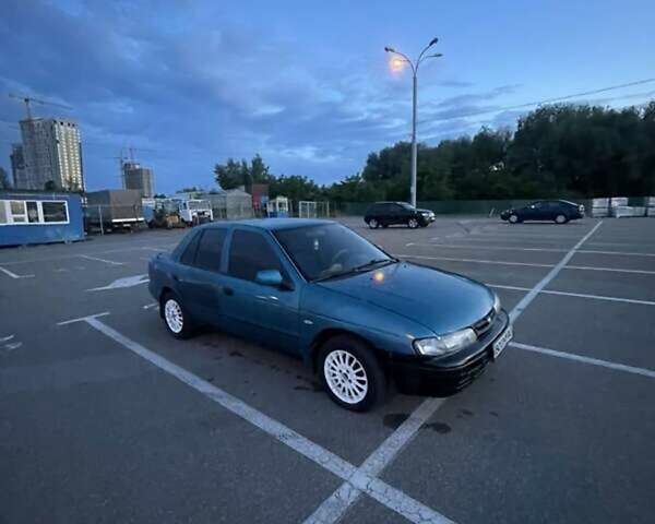 Синий Киа Сефия, объемом двигателя 1.6 л и пробегом 450 тыс. км за 800 $, фото 1 на Automoto.ua