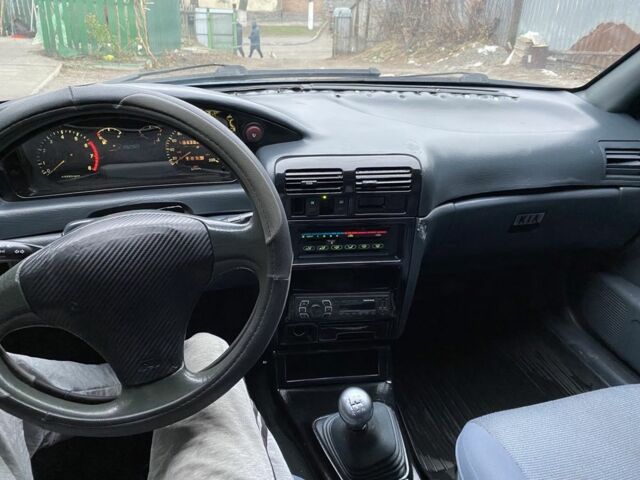 Синій Кіа Сефія, об'ємом двигуна 1.6 л та пробігом 343 тис. км за 950 $, фото 1 на Automoto.ua