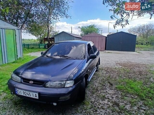 Синий Киа Сефия, объемом двигателя 1.79 л и пробегом 240 тыс. км за 1500 $, фото 1 на Automoto.ua