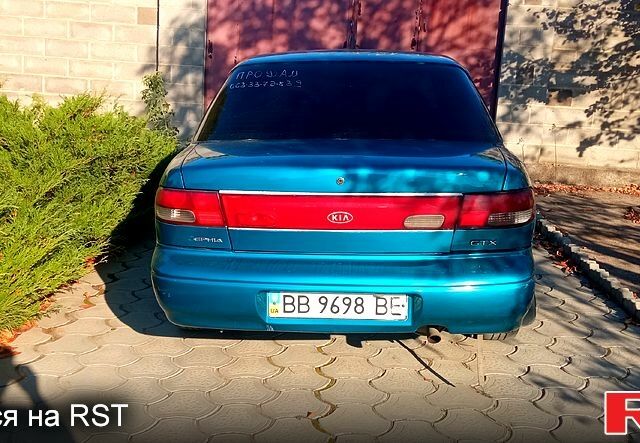 Синий Киа Сефия, объемом двигателя 1.5 л и пробегом 253 тыс. км за 1900 $, фото 1 на Automoto.ua