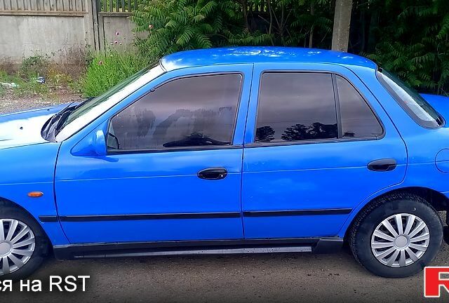 Синий Киа Сефия, объемом двигателя 1.5 л и пробегом 205 тыс. км за 1500 $, фото 1 на Automoto.ua