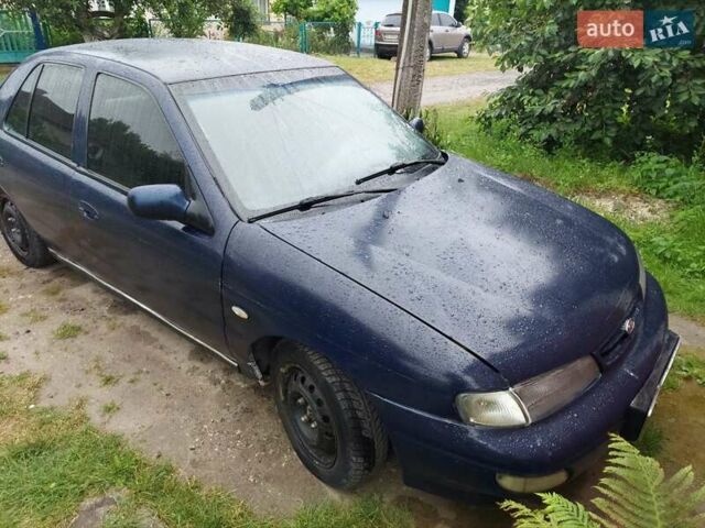 Синий Киа Сефия, объемом двигателя 1.6 л и пробегом 310 тыс. км за 850 $, фото 1 на Automoto.ua