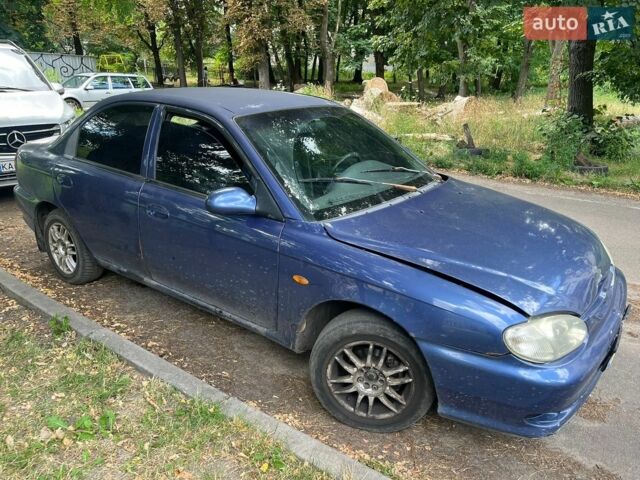 Синий Киа Сефия, объемом двигателя 1.5 л и пробегом 323 тыс. км за 1400 $, фото 1 на Automoto.ua