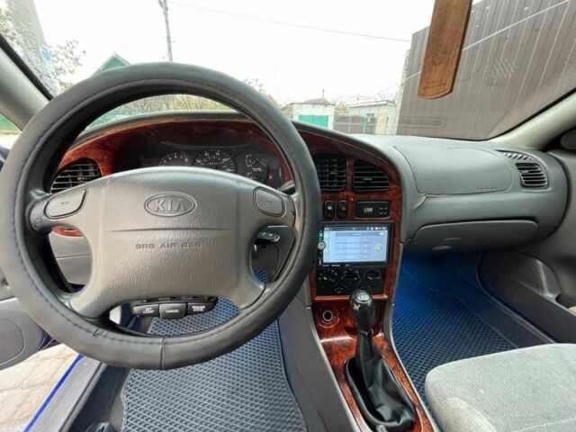 Синий Киа Сефия, объемом двигателя 1.8 л и пробегом 248 тыс. км за 3200 $, фото 1 на Automoto.ua