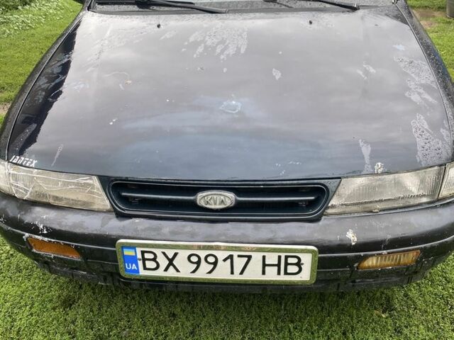 Зеленый Киа Сефия, объемом двигателя 1.6 л и пробегом 300 тыс. км за 700 $, фото 1 на Automoto.ua