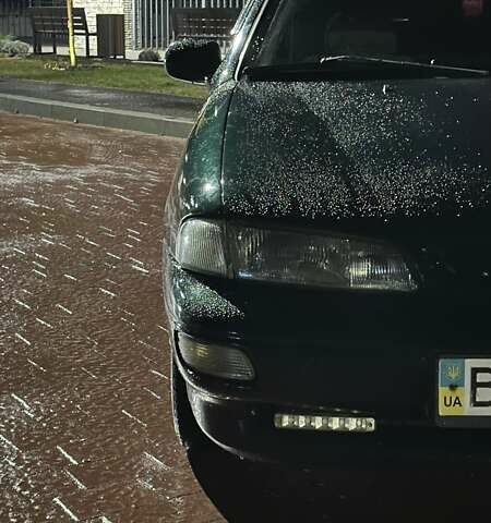 Зеленый Киа Сефия, объемом двигателя 1.5 л и пробегом 318 тыс. км за 1450 $, фото 1 на Automoto.ua