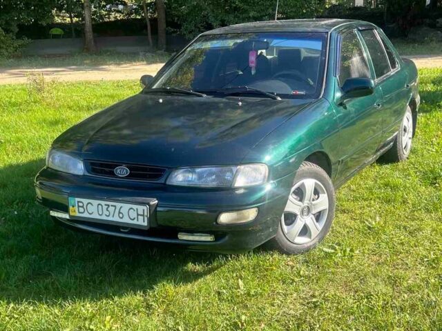 Зелений Кіа Сефія, об'ємом двигуна 1.5 л та пробігом 317 тис. км за 900 $, фото 1 на Automoto.ua