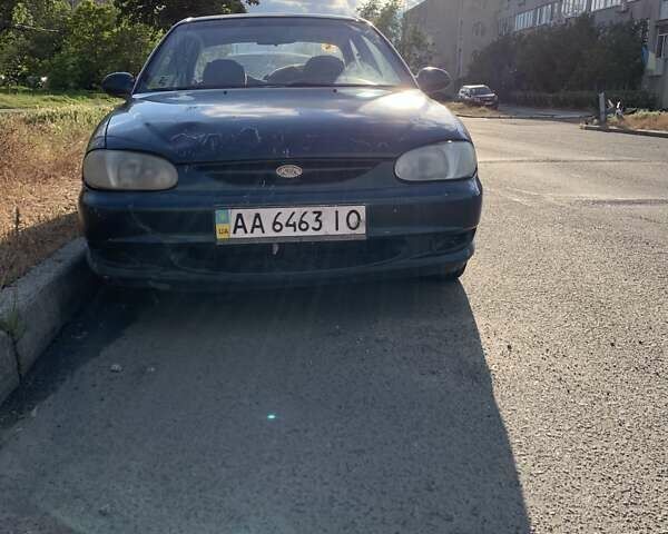 Зеленый Киа Сефия, объемом двигателя 1.5 л и пробегом 250 тыс. км за 700 $, фото 1 на Automoto.ua