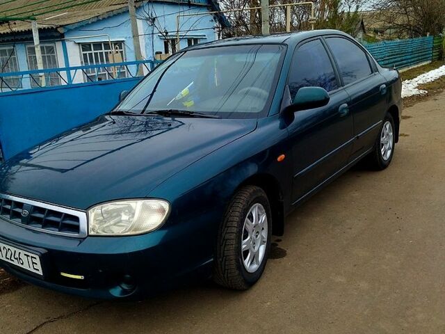 Зеленый Киа Сефия, объемом двигателя 1.6 л и пробегом 450 тыс. км за 3800 $, фото 1 на Automoto.ua