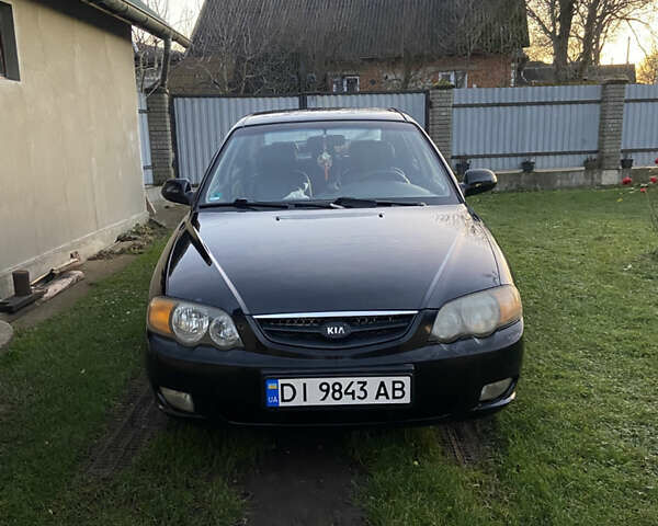 Черный Киа Шума, объемом двигателя 1.6 л и пробегом 308 тыс. км за 3100 $, фото 1 на Automoto.ua