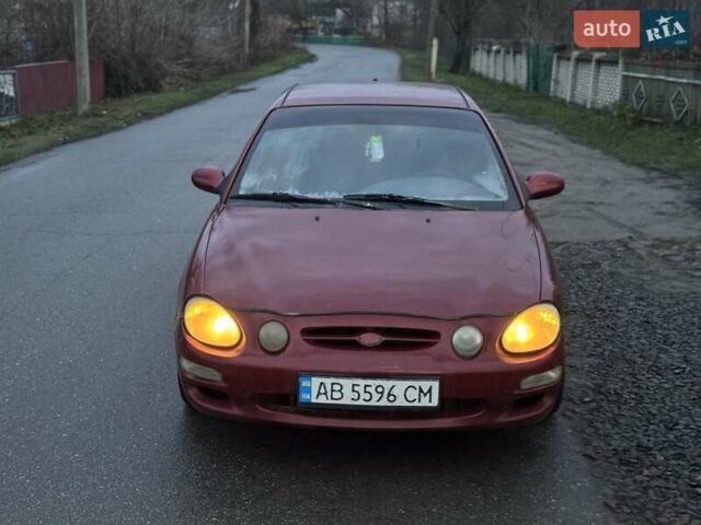 Красный Киа Шума, объемом двигателя 1.5 л и пробегом 111 тыс. км за 600 $, фото 1 на Automoto.ua