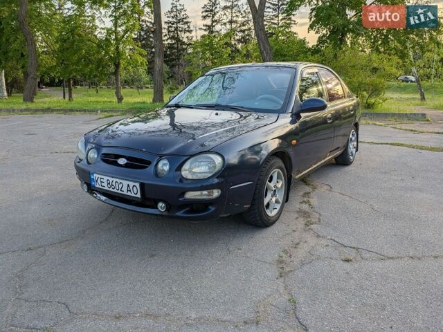 Синий Киа Шума, объемом двигателя 1.8 л и пробегом 421 тыс. км за 1150 $, фото 1 на Automoto.ua