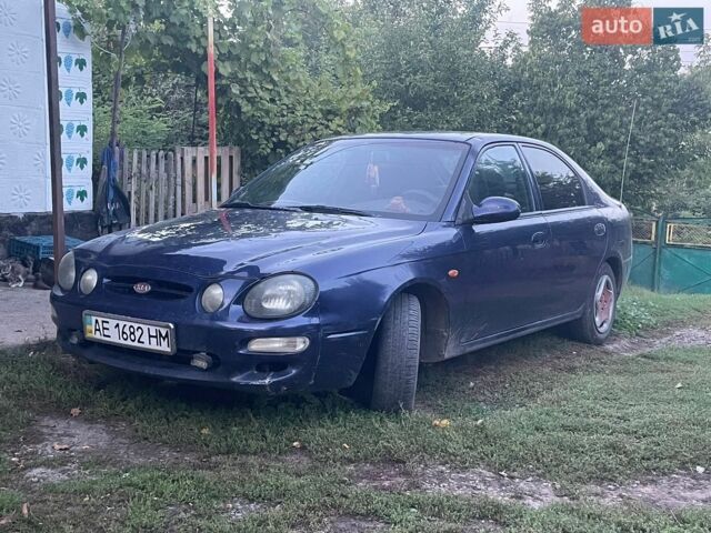 Синий Киа Шума, объемом двигателя 1.8 л и пробегом 211 тыс. км за 1350 $, фото 1 на Automoto.ua