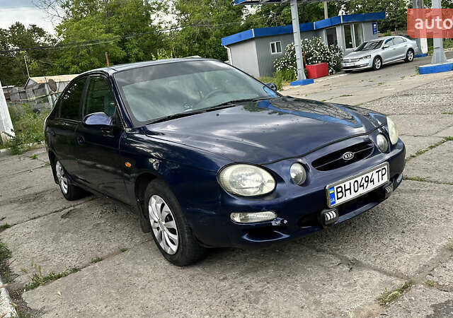 Синій Кіа Шума, об'ємом двигуна 1.5 л та пробігом 306 тис. км за 2400 $, фото 1 на Automoto.ua