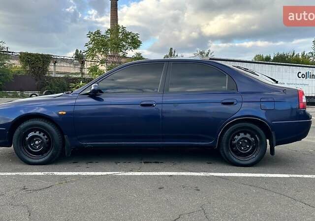 Синий Киа Шума, объемом двигателя 1.8 л и пробегом 310 тыс. км за 1500 $, фото 1 на Automoto.ua