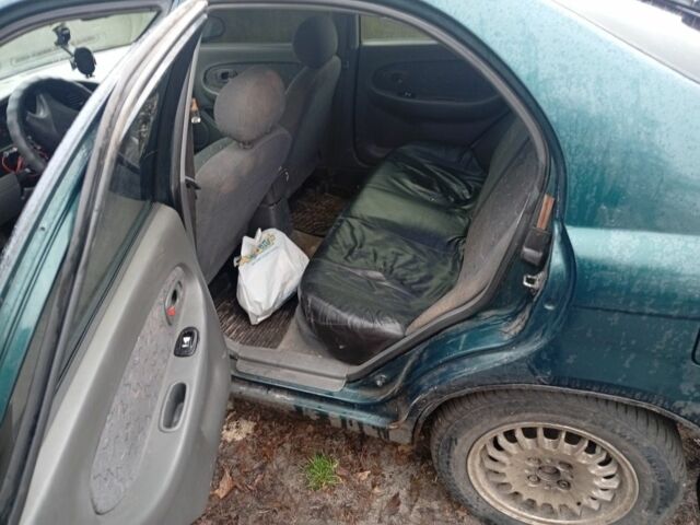 Зеленый Киа Шума, объемом двигателя 1.5 л и пробегом 460 тыс. км за 1000 $, фото 1 на Automoto.ua