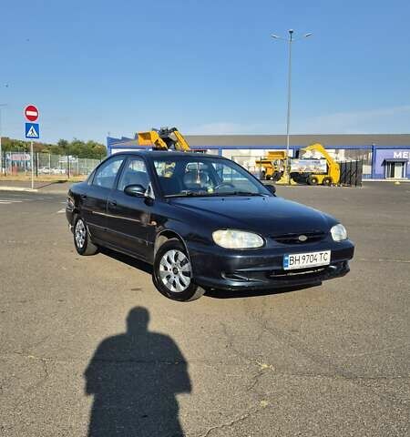 Зеленый Киа Шума, объемом двигателя 1.5 л и пробегом 328 тыс. км за 2000 $, фото 1 на Automoto.ua