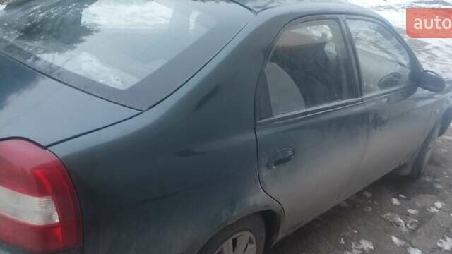 Зеленый Киа Шума, объемом двигателя 1.6 л и пробегом 190 тыс. км за 1555 $, фото 1 на Automoto.ua