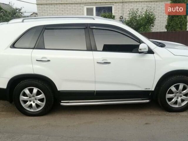 Белый Киа Соренто, объемом двигателя 2.4 л и пробегом 167 тыс. км за 12200 $, фото 1 на Automoto.ua