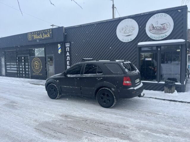 Чорний Кіа Соренто, об'ємом двигуна 2.5 л та пробігом 320 тис. км за 4650 $, фото 1 на Automoto.ua