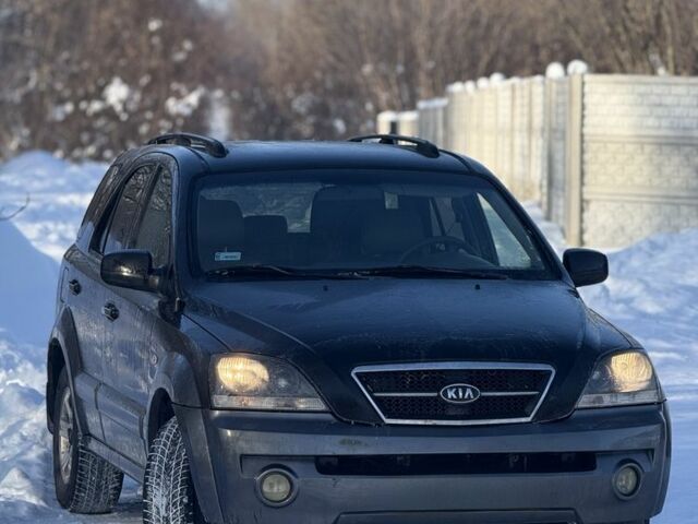 Черный Киа Соренто, объемом двигателя 2.5 л и пробегом 300 тыс. км за 3999 $, фото 1 на Automoto.ua