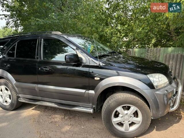Черный Киа Соренто, объемом двигателя 2.5 л и пробегом 355 тыс. км за 4500 $, фото 1 на Automoto.ua