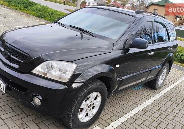 Черный Киа Соренто, объемом двигателя 2.5 л и пробегом 240 тыс. км за 7500 $, фото 1 на Automoto.ua