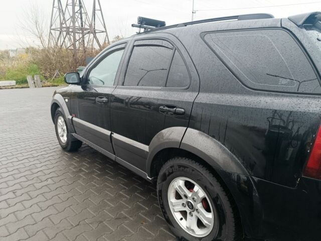 Черный Киа Соренто, объемом двигателя 3.5 л и пробегом 327 тыс. км за 3400 $, фото 1 на Automoto.ua