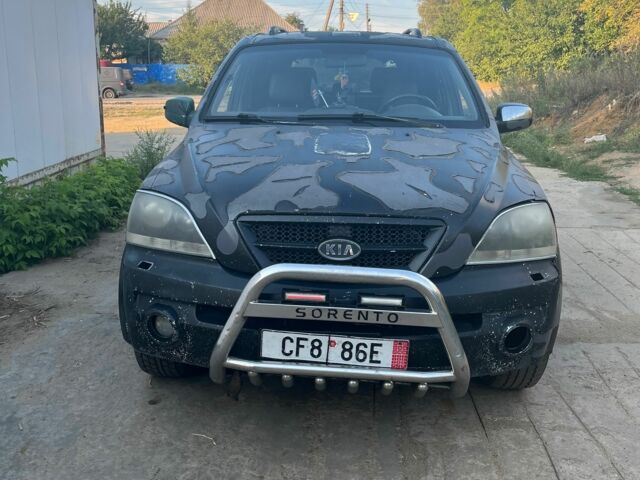 Черный Киа Соренто, объемом двигателя 2.5 л и пробегом 325 тыс. км за 4017 $, фото 1 на Automoto.ua