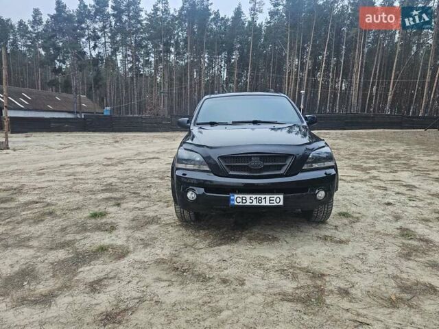 Черный Киа Соренто, объемом двигателя 2.5 л и пробегом 250 тыс. км за 5200 $, фото 1 на Automoto.ua