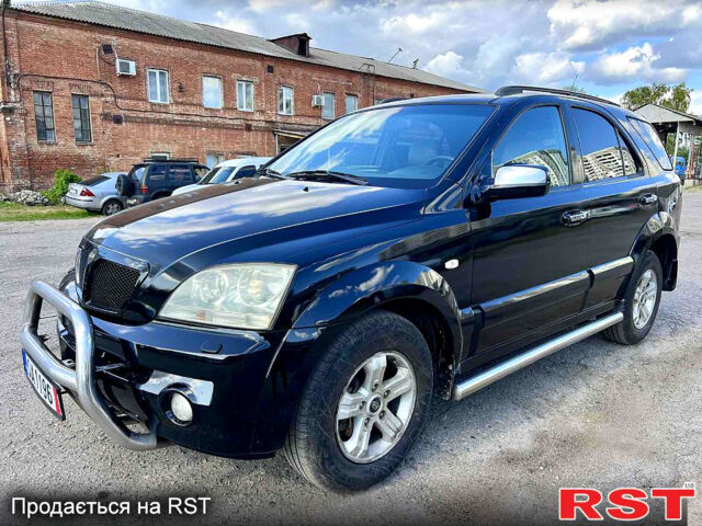 Черный Киа Соренто, объемом двигателя 2.5 л и пробегом 304 тыс. км за 3800 $, фото 1 на Automoto.ua