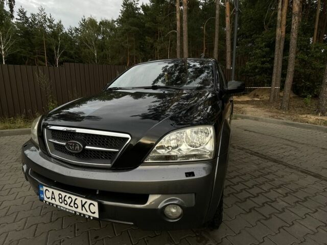 Черный Киа Соренто, объемом двигателя 2.5 л и пробегом 299 тыс. км за 4400 $, фото 1 на Automoto.ua