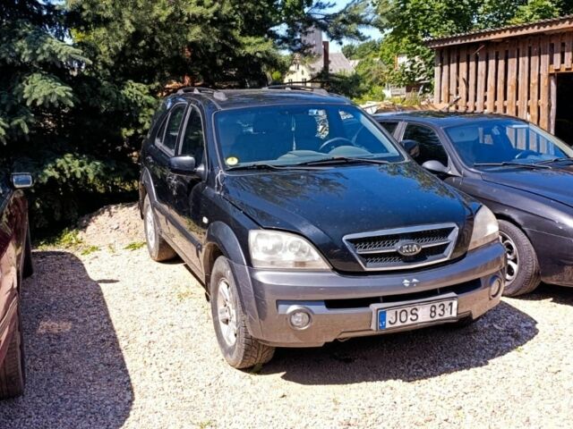 Черный Киа Соренто, объемом двигателя 2.4 л и пробегом 310 тыс. км за 3650 $, фото 1 на Automoto.ua