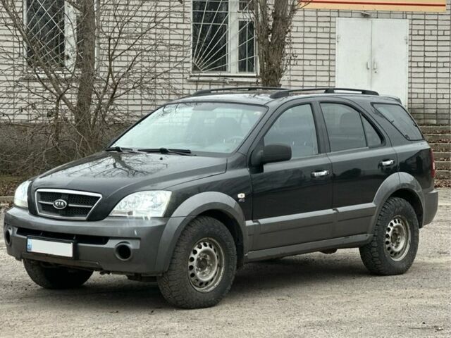 Черный Киа Соренто, объемом двигателя 2.5 л и пробегом 230 тыс. км за 3500 $, фото 1 на Automoto.ua
