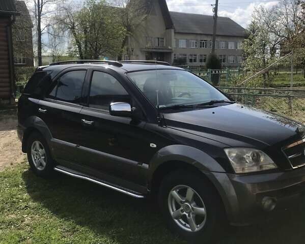 Черный Киа Соренто, объемом двигателя 2.5 л и пробегом 262 тыс. км за 9200 $, фото 1 на Automoto.ua