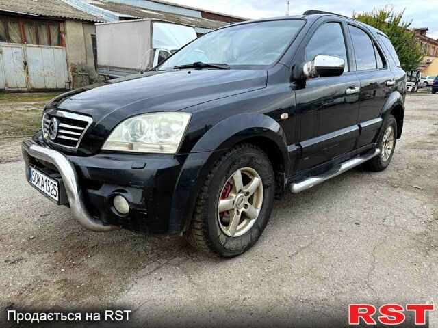 Черный Киа Соренто, объемом двигателя 2.5 л и пробегом 254 тыс. км за 3700 $, фото 1 на Automoto.ua