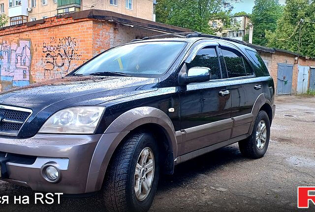 Черный Киа Соренто, объемом двигателя 2.5 л и пробегом 350 тыс. км за 4000 $, фото 1 на Automoto.ua