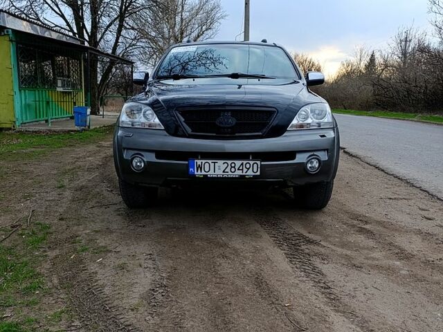 Черный Киа Соренто, объемом двигателя 25 л и пробегом 320 тыс. км за 4800 $, фото 1 на Automoto.ua
