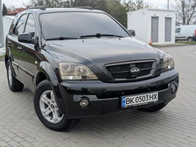 Черный Киа Соренто, объемом двигателя 2.5 л и пробегом 300 тыс. км за 8000 $, фото 1 на Automoto.ua