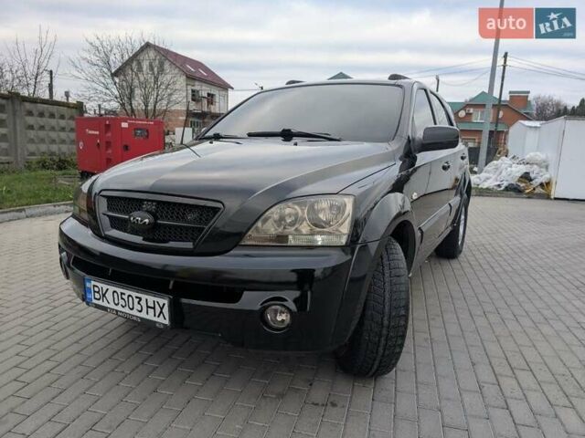 Черный Киа Соренто, объемом двигателя 2.5 л и пробегом 300 тыс. км за 8000 $, фото 1 на Automoto.ua