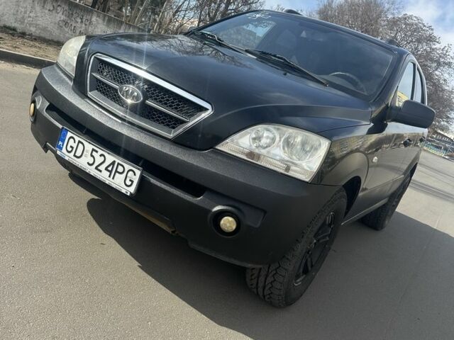 Черный Киа Соренто, объемом двигателя 2.5 л и пробегом 317 тыс. км за 4300 $, фото 1 на Automoto.ua