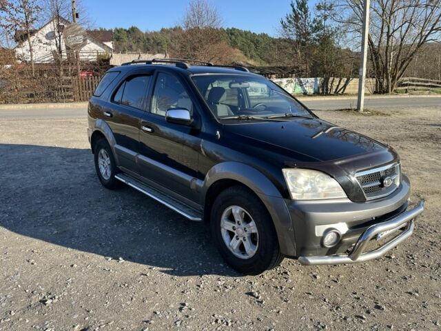 Черный Киа Соренто, объемом двигателя 2.4 л и пробегом 205 тыс. км за 6650 $, фото 1 на Automoto.ua