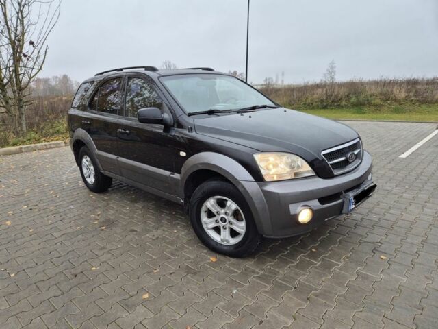 Черный Киа Соренто, объемом двигателя 2.5 л и пробегом 250 тыс. км за 4577 $, фото 1 на Automoto.ua