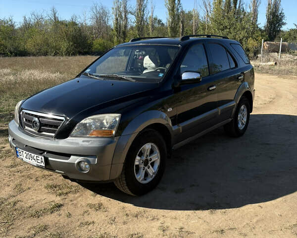 Черный Киа Соренто, объемом двигателя 2.5 л и пробегом 300 тыс. км за 4700 $, фото 1 на Automoto.ua