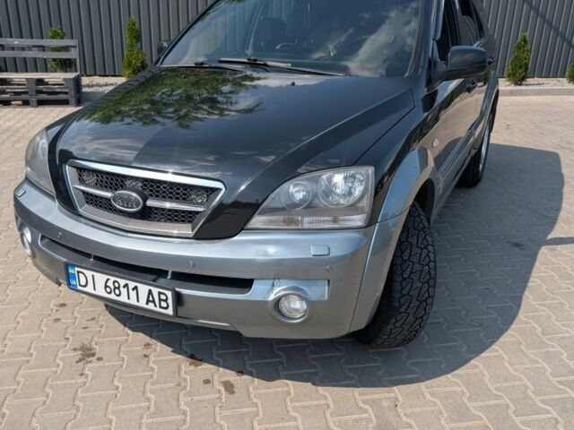 Черный Киа Соренто, объемом двигателя 2.5 л и пробегом 357 тыс. км за 8200 $, фото 1 на Automoto.ua