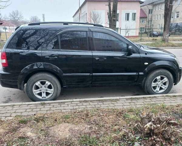 Черный Киа Соренто, объемом двигателя 2.5 л и пробегом 240 тыс. км за 7500 $, фото 1 на Automoto.ua