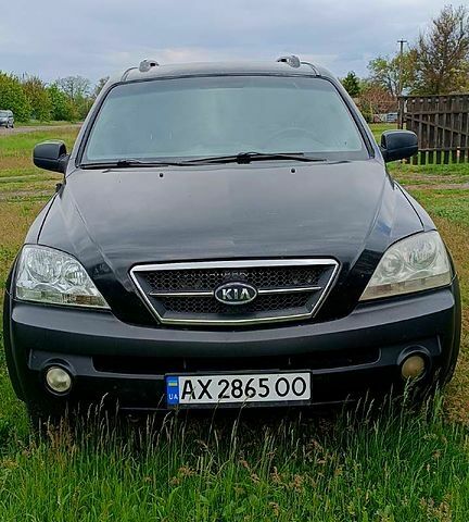 Черный Киа Соренто, объемом двигателя 3.5 л и пробегом 293 тыс. км за 5500 $, фото 1 на Automoto.ua